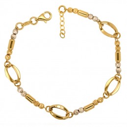Złota bransoletka z owalnymi pierścieniami, dekorowana elementami z białego złota