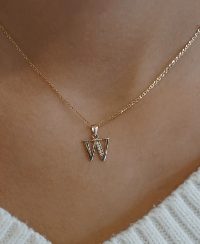 Złota zawieszka literka W pr. 585